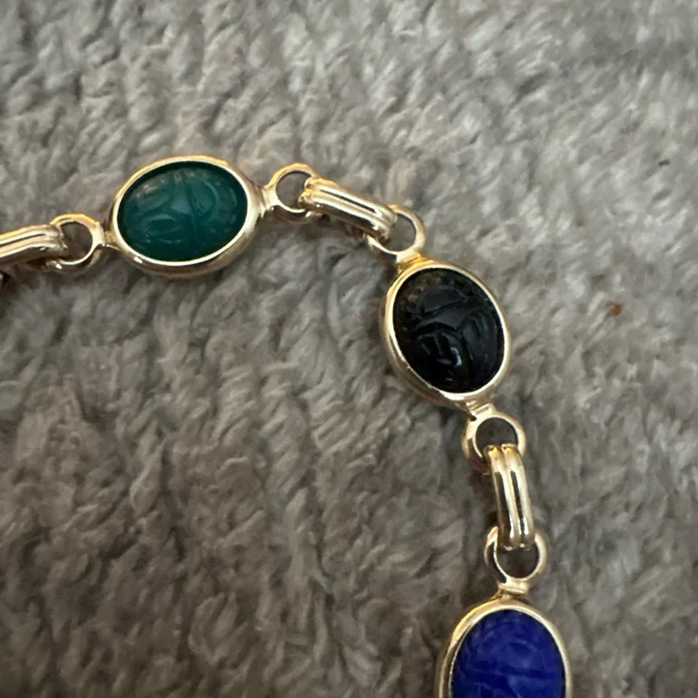 EUC multi stone gold tone bracelet